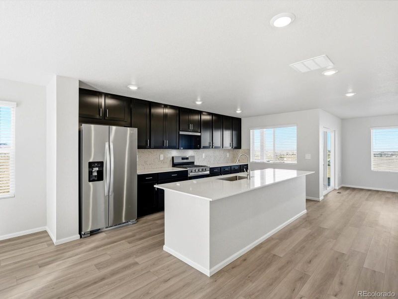 Furnished interior view inside a new home in Three Hills, Morrison (Image 8).