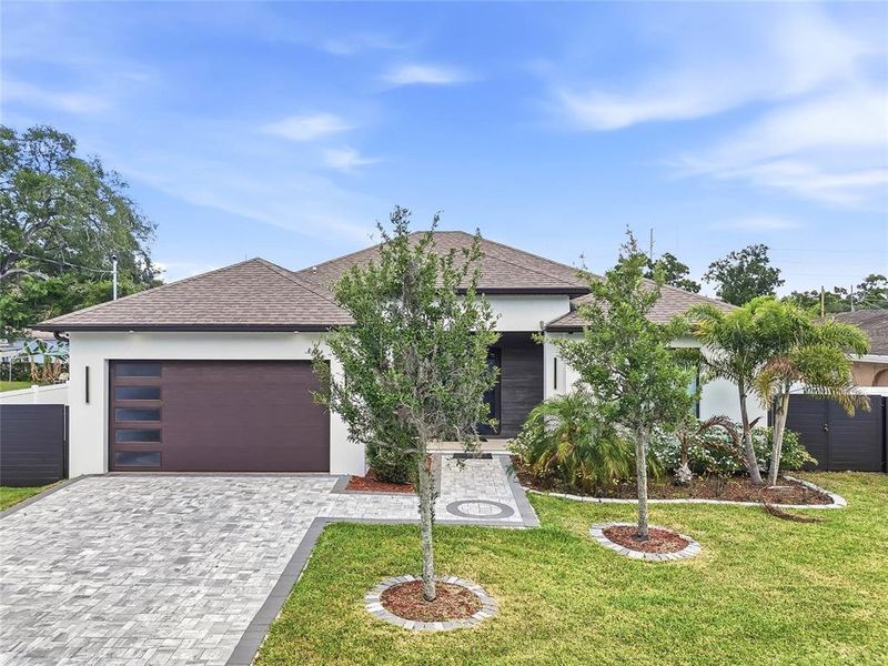 Front exterior of a new home in , Tampa, FL, highlighting curb appeal (Image 28).