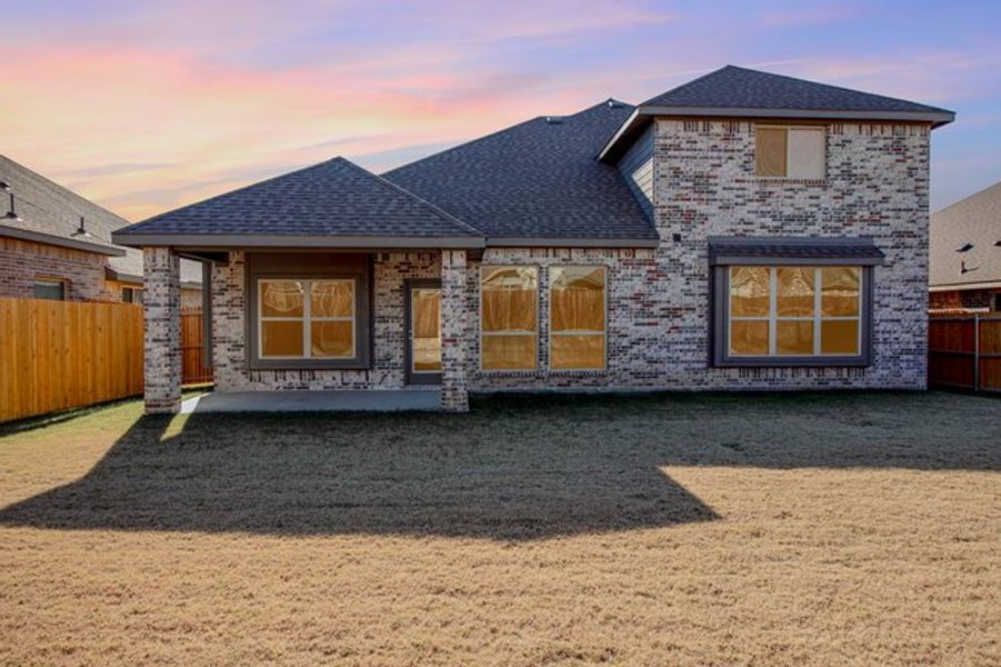 Exterior details and patio area of a home in Mustang Place II, Heartland (Image 19).