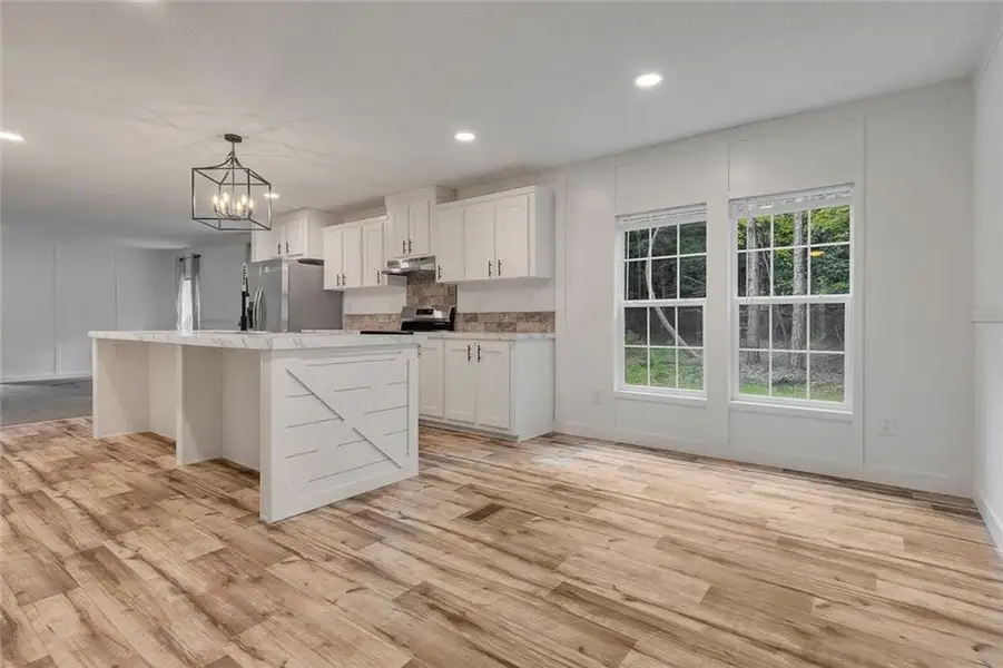 Furnished interior view inside a new home in , Maysville (Image 8).