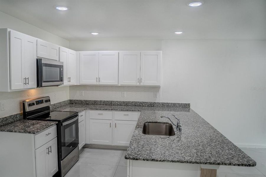 Furnished interior view inside a new home in Spring Hill Classic, Spring Hill (Image 4).