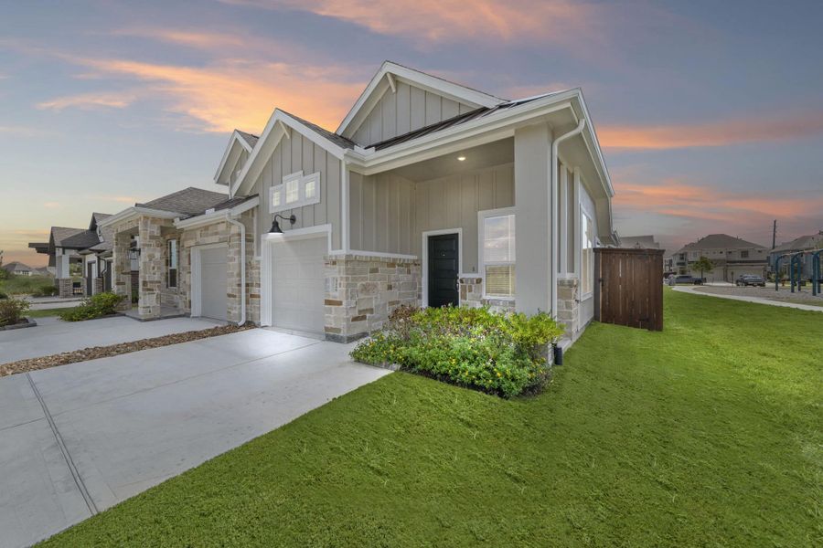 Exterior details and patio area of a home in Meridiana, Manvel (Image 19).