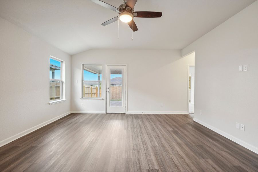 Living room in the Allen floorplan at a Meritage Homes community.