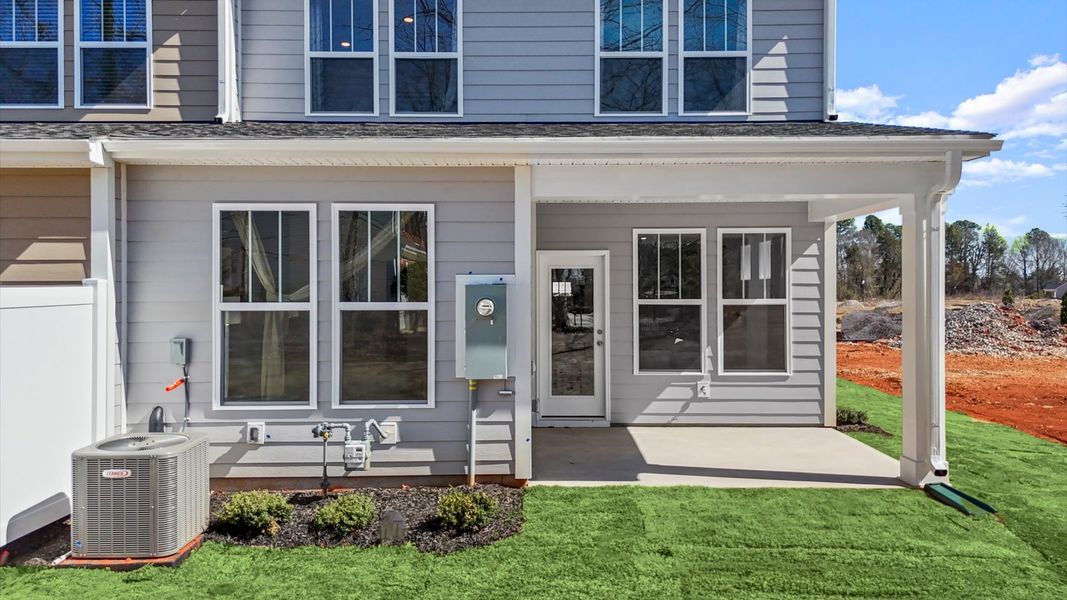 Exclusive rear covered porch of the Lawson Design with accomplished detail and elevated outdoor living potential