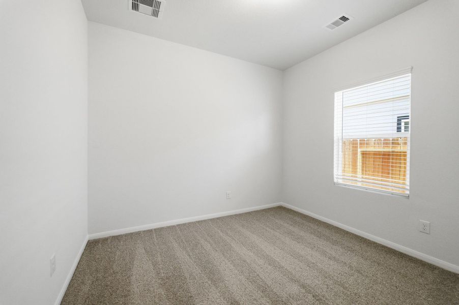 Spacious, unfurnished interior of a new home in The Pines at Seven Coves, Willis (Image 19).