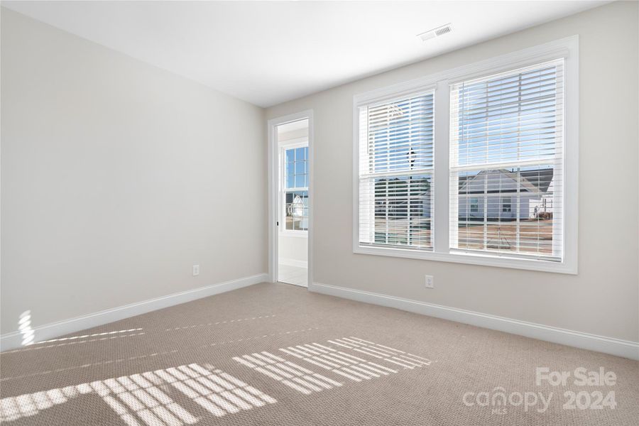 Bedroom # 1 has great natural light and shares a bathroom with Bedroom # 2.