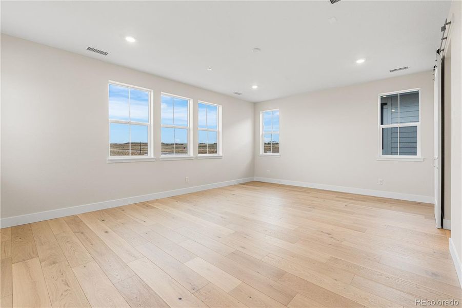 Spacious, unfurnished interior of a new home in Luxe at The Canyons, Castle Pines (Image 43).