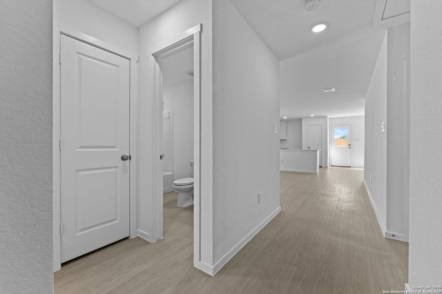 Spacious, unfurnished interior of a new home in Torian Village: Watermill Collection, San Antonio (Image 13).