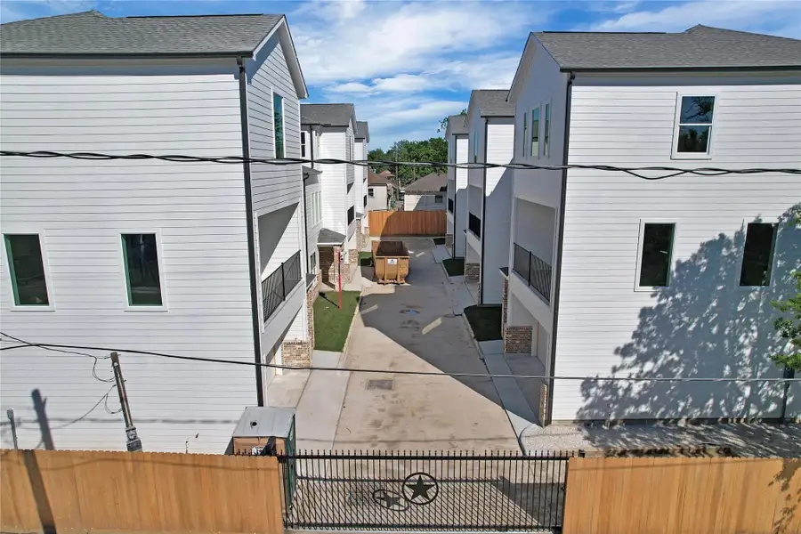 Exterior details and patio area of a home in , Houston (Image 1). Exterior details and patio area of a home in , Houston (Image 1).