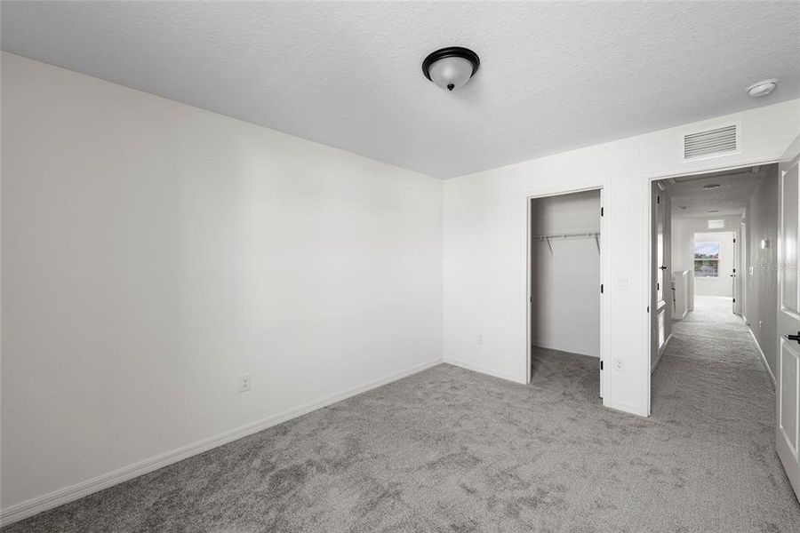 Spacious, unfurnished interior of a new home in Heron Bay, Palmetto (Image 24). Spacious, unfurnished interior of a new home in Heron Bay, Palmetto (Image 24).