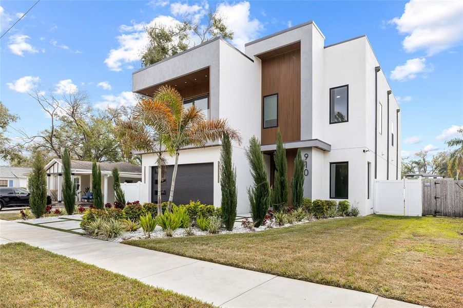 Front exterior of a new home in , Tampa, FL, highlighting curb appeal (Image 23).