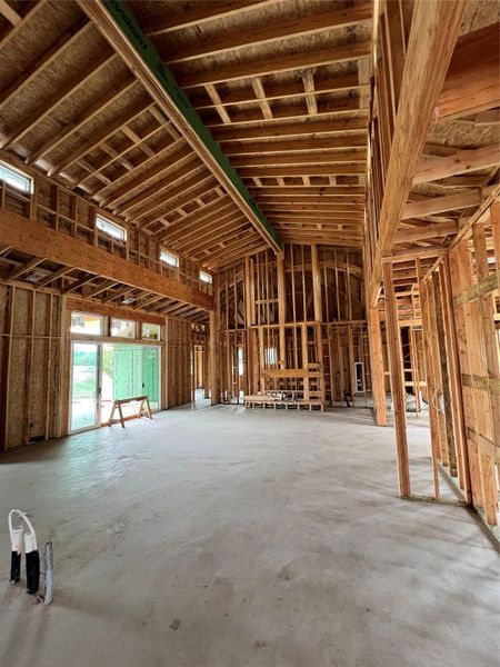 Misc room featuring concrete floors and a garage