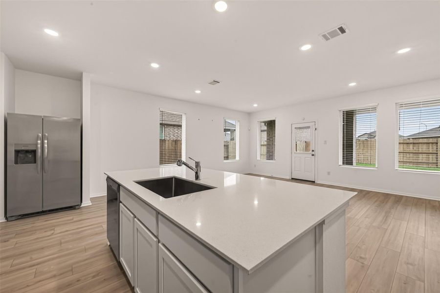 Furnished interior view inside a new home in Sunterra, Katy (Image 7).