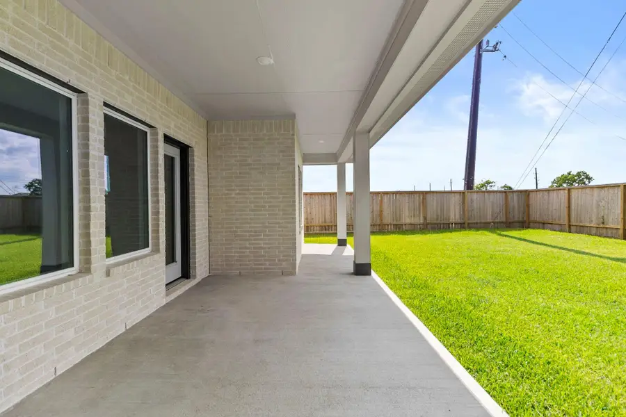 Exterior details and patio area of a home in Riverside Estates, Mont Belvieu (Image 3).