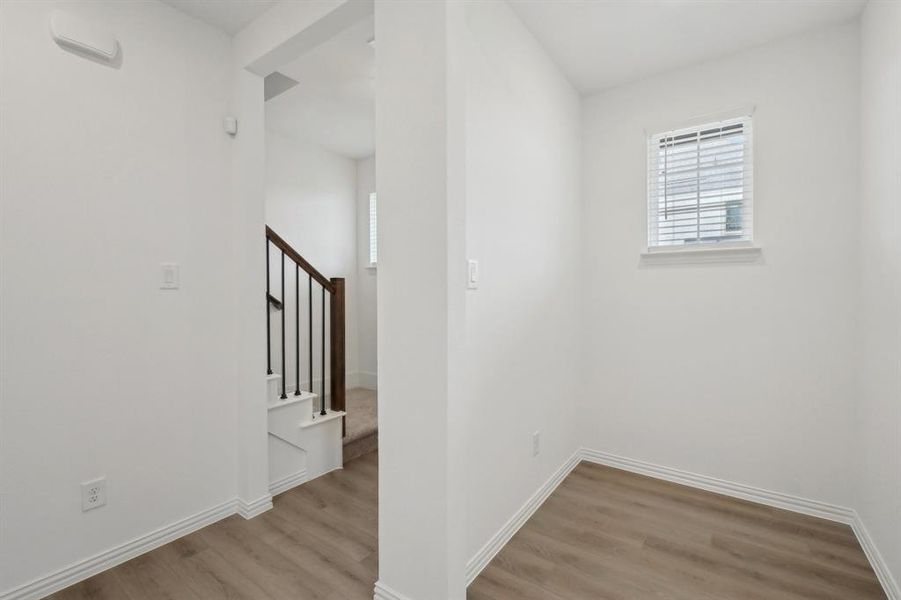 Spare room featuring light hardwood / wood-style floors