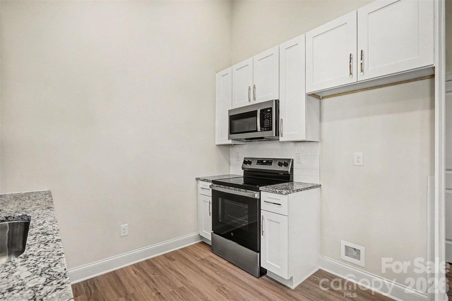 Furnished interior view inside a new home in , Monroe (Image 5).