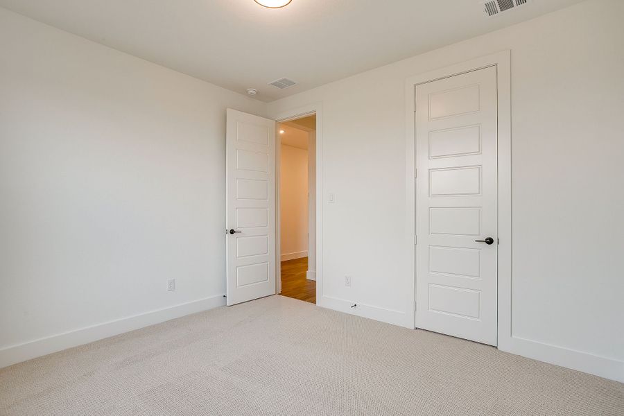 Representative unfurnished interior of a home built from the Valera by Graham Hart Home Builder in Bear Ridge, Burleson (Image 28).