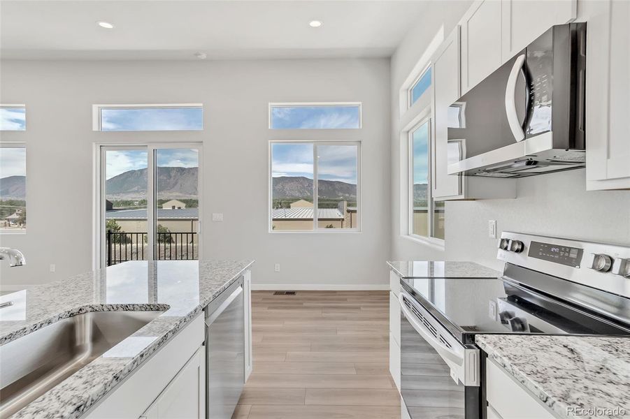 Furnished interior view inside a new home in , Monument (Image 8).