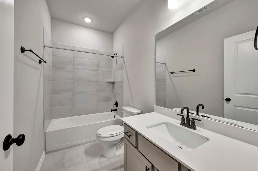 Furnished interior view inside a new home in Heritage, Dripping Springs (Image 18).