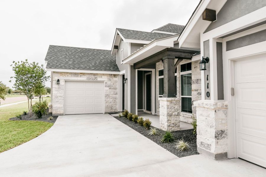 Front exterior of a home in the Escalera Ranch 1833 community, located in Victoria, TX (Image 13).