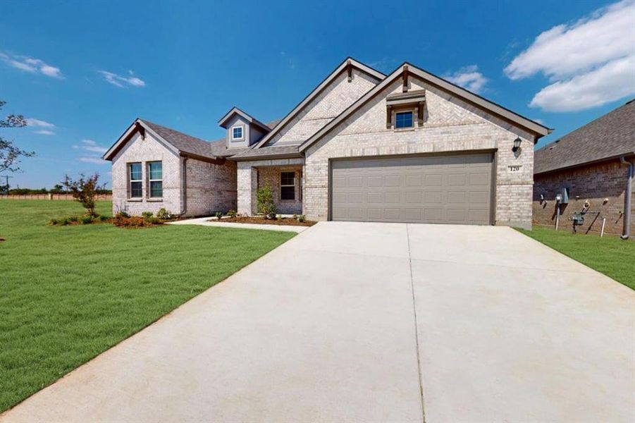 Front exterior of a new home in The Preserve, Justin, TX, highlighting curb appeal (Image 2). Front exterior of a new home in The Preserve, Justin, TX, highlighting curb appeal (Image 2).