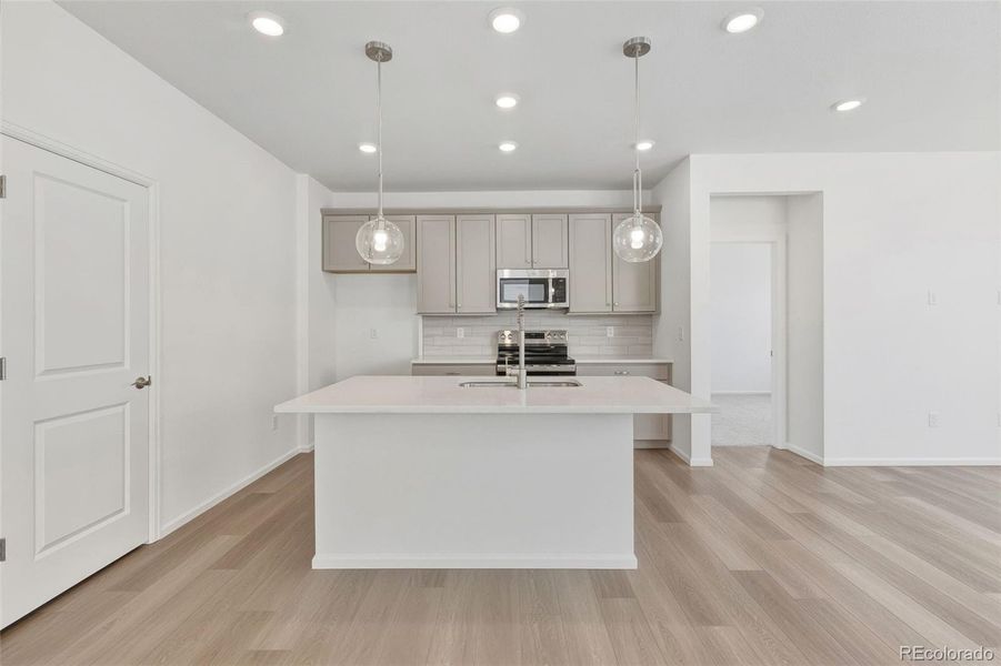 Furnished interior view inside a new home in The Cottages Collection at Ridgeline Vista, Brighton (Image 8).
