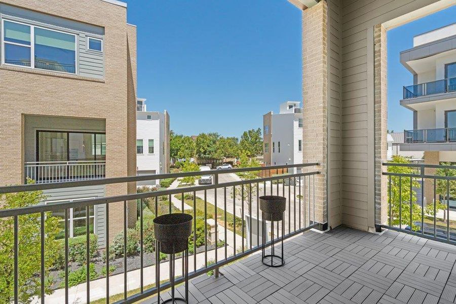Step onto this private balcony offering tranquil views of the landscaped grounds and modern residences. Step onto this private balcony offering tranquil views of the landscaped grounds and modern residences.