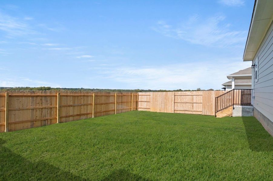 Exterior details and patio area of a home in Cloverleaf, Austin (Image 4).