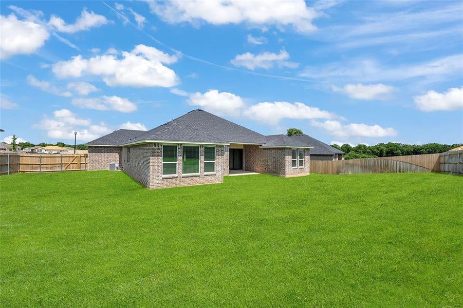 Please Note: These exterior photos are not of the actual home but are of a completed one with a similar floor plan. Finishes, features, and layouts may vary.