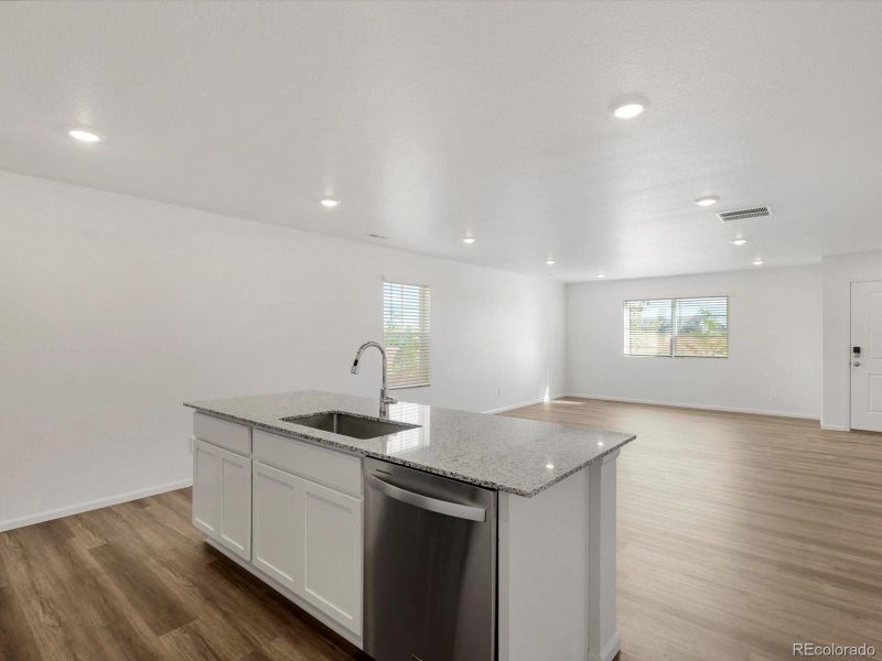 Spacious Island. Granite Countertops.