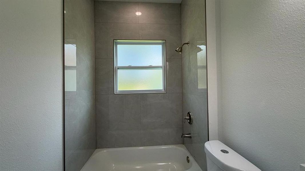 Furnished interior view inside a new home in , Dunnellon (Image 12).