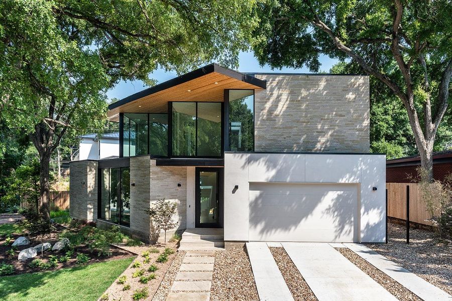 Front exterior of a new home in , Austin, TX, highlighting curb appeal (Image 17).
