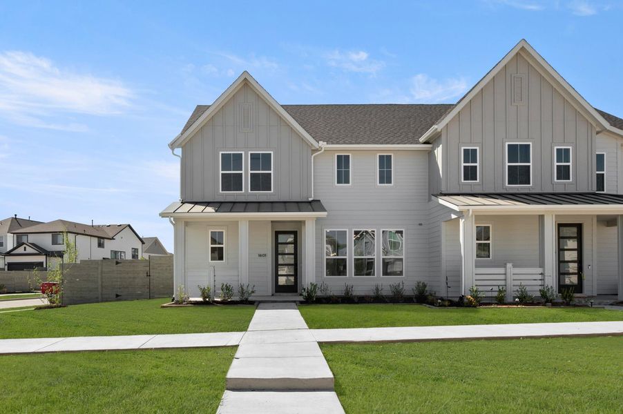Front exterior of a new home in The Retreat at Harvest, Argyle, TX, highlighting curb appeal (Image 1). Front exterior of a new home in The Retreat at Harvest, Argyle, TX, highlighting curb appeal (Image 1).
