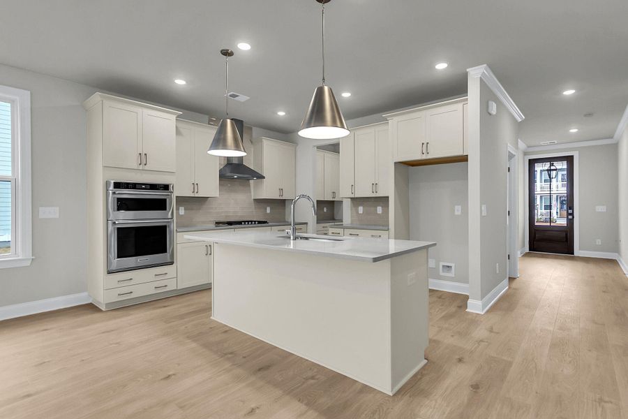 Furnished interior view inside a new home in Tidewater at Lakes of Cane Bay, Summerville (Image 8).