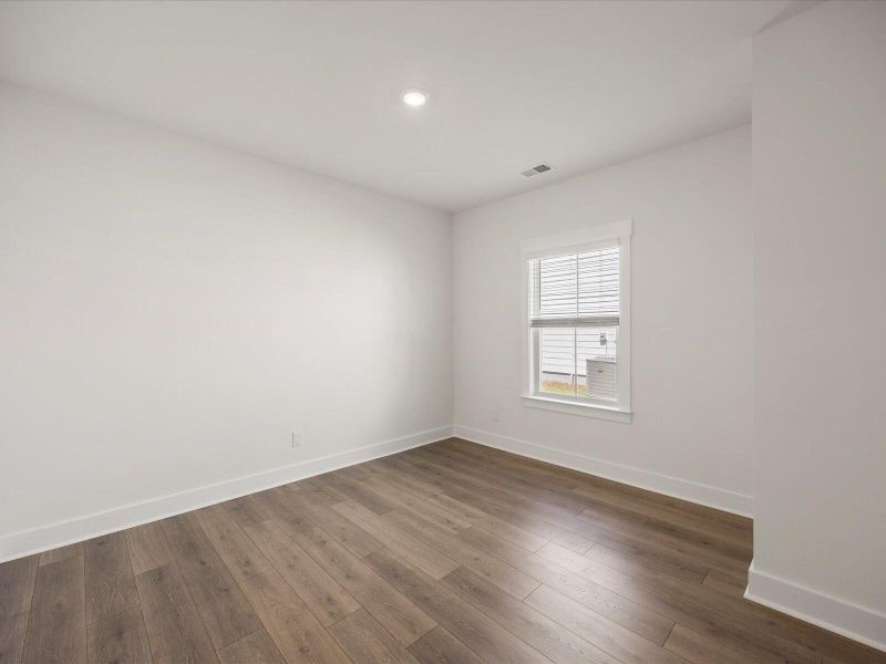 Spacious, unfurnished interior of a new home in The Coves at Lakes of Cane Bay, Summerville (Image 34). Spacious, unfurnished interior of a new home in The Coves at Lakes of Cane Bay, Summerville (Image 34).