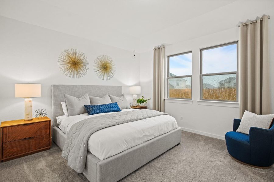 Primary suite in the Oak home plan by Trophy Signature Homes – REPRESENTATIVE PHOTO
