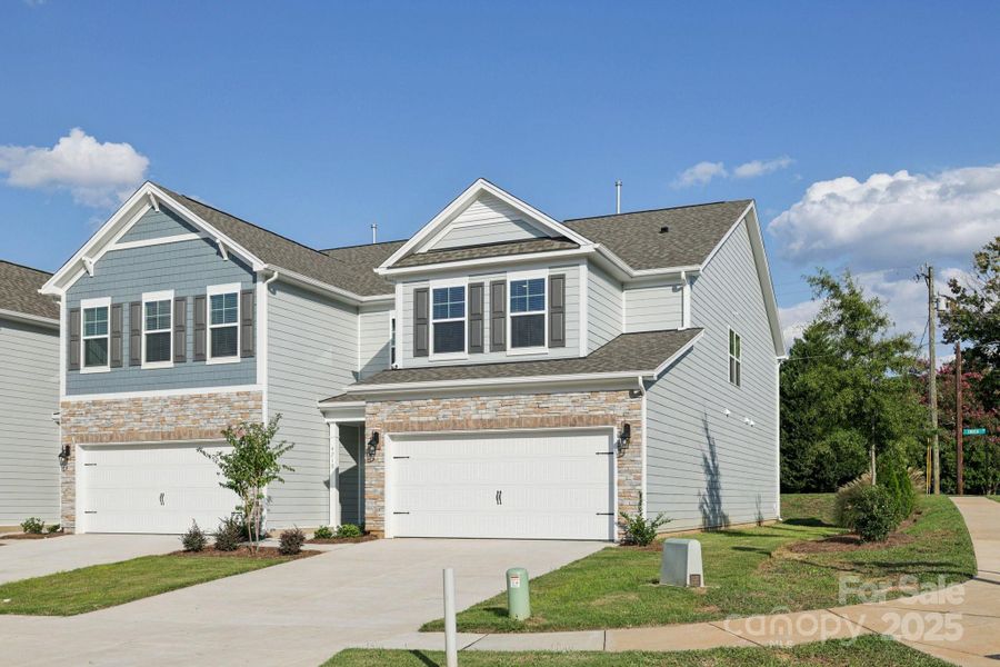 Front exterior of a new home in Blackstone Bay Townhomes, Sherrills Ford, NC, highlighting curb appeal (Image 18).