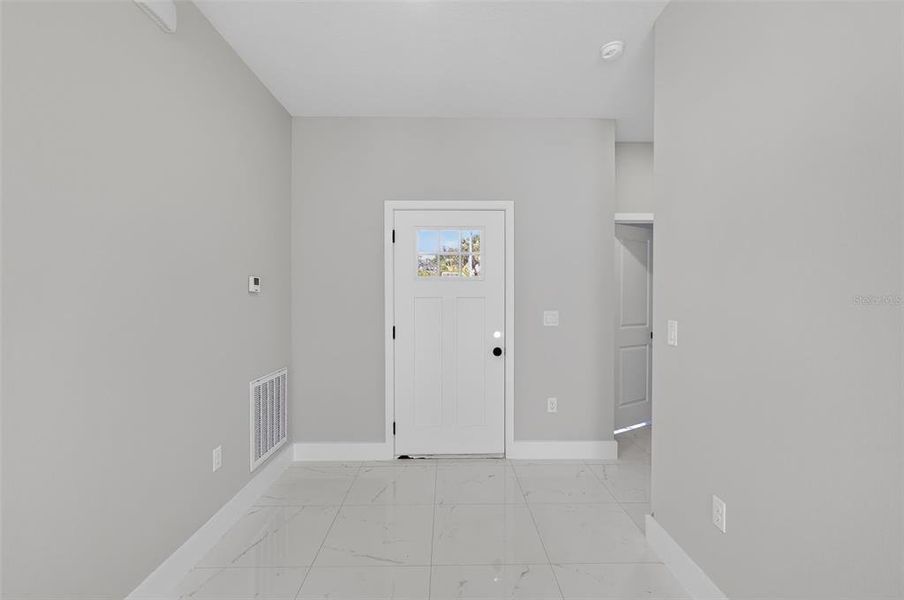 Spacious, unfurnished interior of a new home in , Port Charlotte (Image 30).