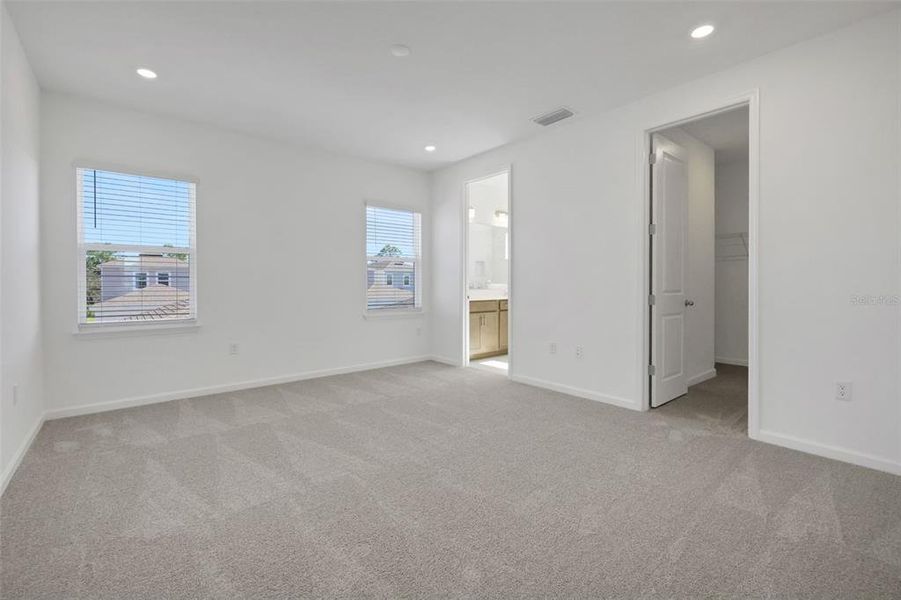 Spacious, unfurnished interior of a new home in Serenade at Ovation, Winter Garden (Image 36).