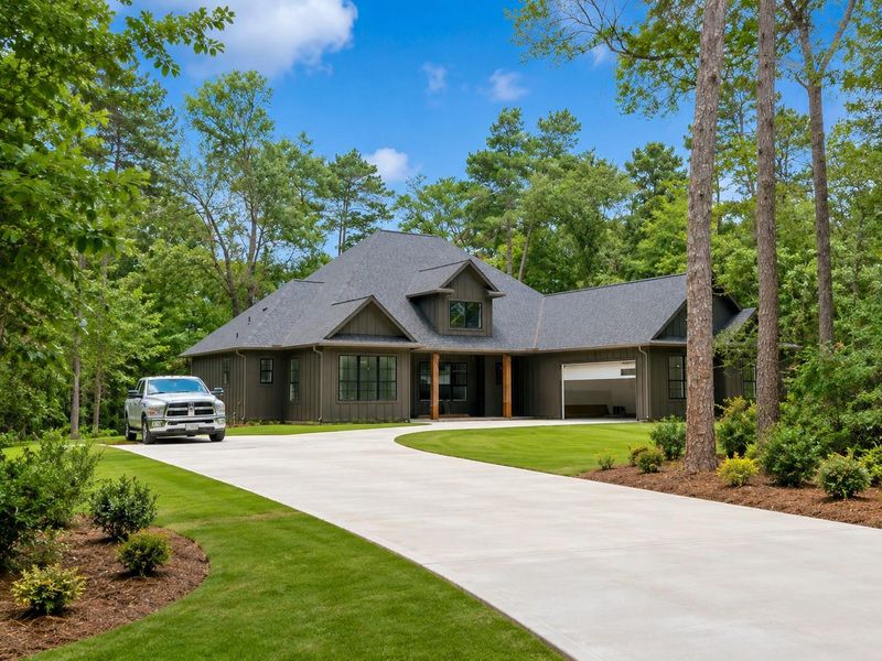 Front exterior of a new home in , Plantersville, TX, highlighting curb appeal (Image 28).