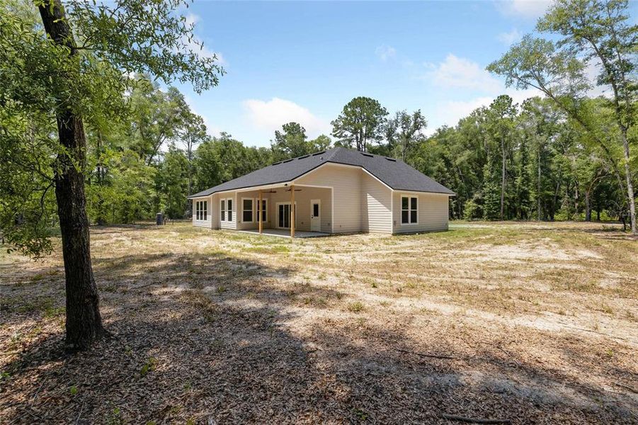 Exterior details and patio area of a home in , Alachua (Image 33).