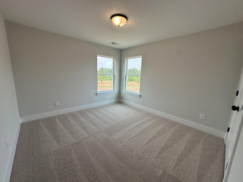 Spacious, unfurnished interior of a new home in Blythe Mill Townhomes, Waxhaw (Image 14).