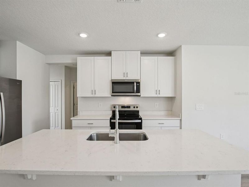 Furnished interior view inside a new home in Leyland Preserve - Premier Series, Brooksville (Image 6). Furnished interior view inside a new home in Leyland Preserve - Premier Series, Brooksville (Image 6).