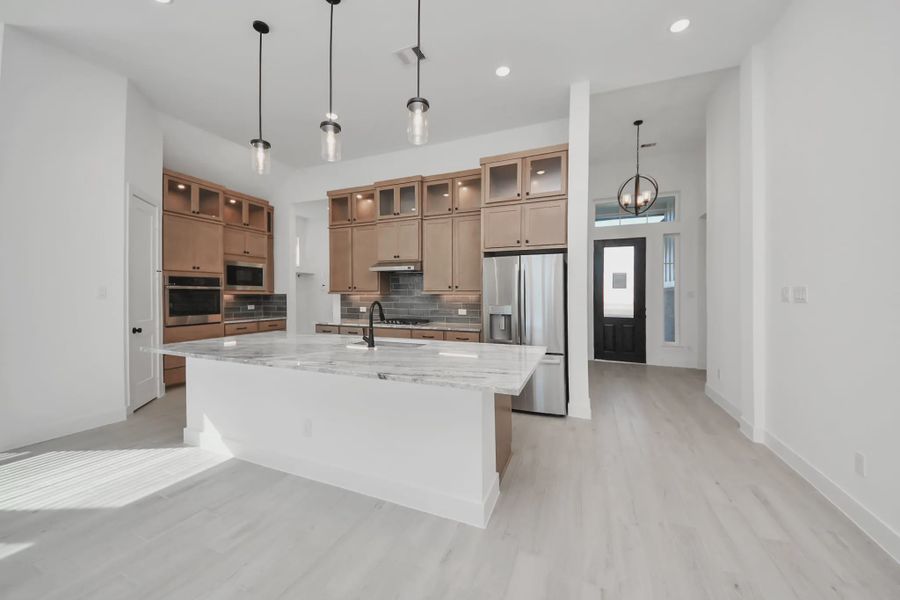 Representative furnished interior of a home built from the Summerton by Chesmar Homes in Meridiana 50's and 60's, Manvel (Image 16).