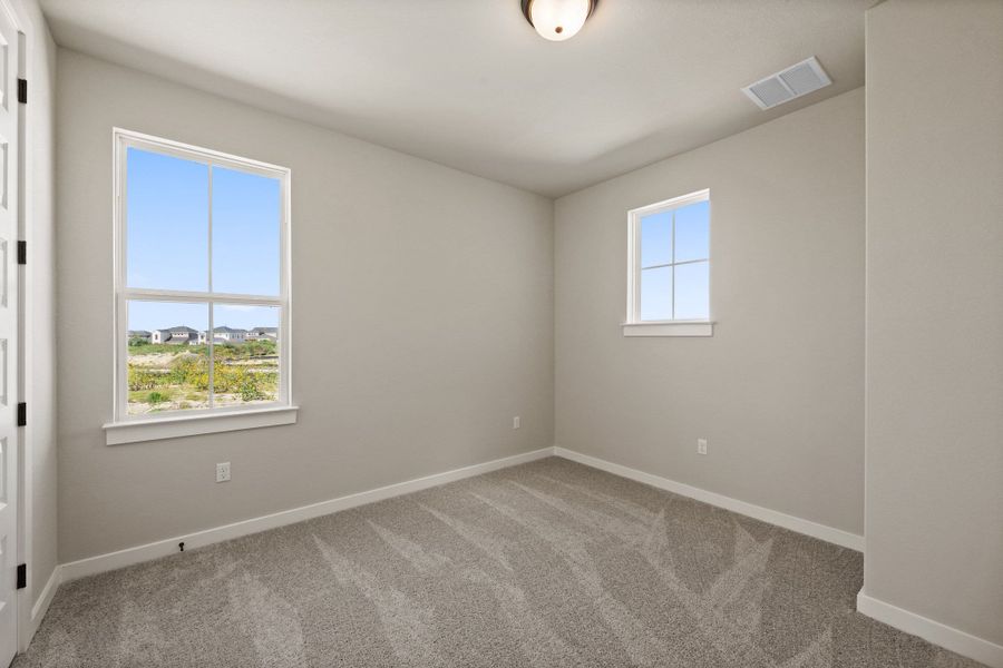 Spacious, unfurnished interior of a new home in Terrace Collection At Turner's Crossing, Buda (Image 41).