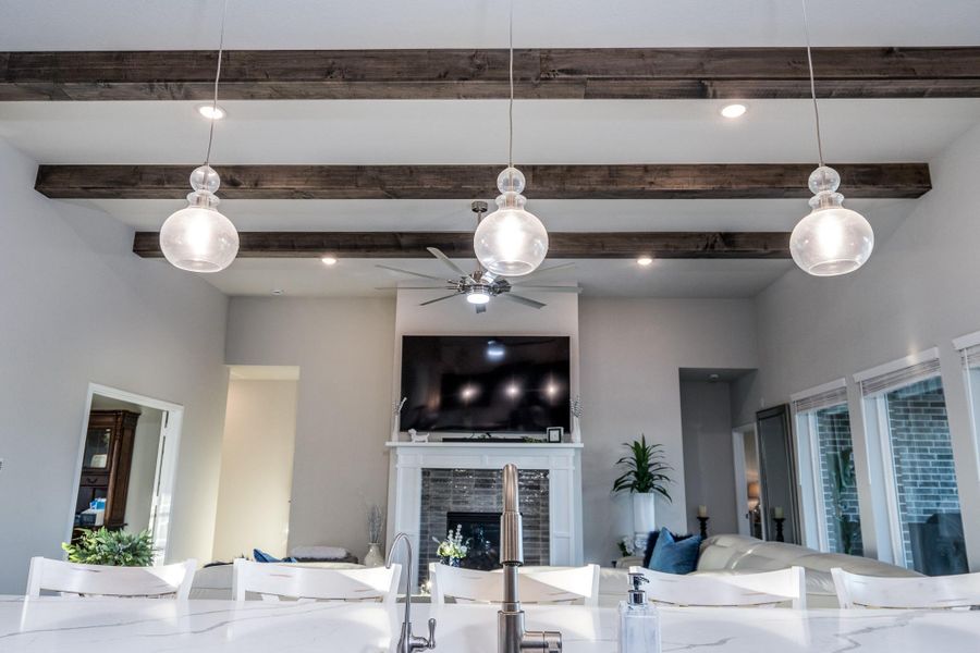 Frosted designer pendant lights strategically placed over the 12 foot island. Filtered water at the sink.