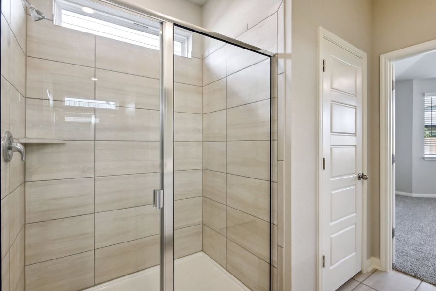 Primary suite bathroom in the Medina floorplan at a Meritage Homes community.