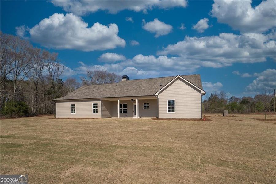 Exterior details and patio area of a home in , Social Circle (Image 2). Exterior details and patio area of a home in , Social Circle (Image 2).