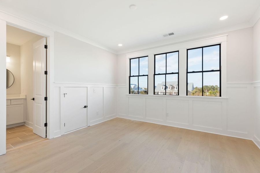 Spacious, unfurnished interior of a new home in Rivercroft, Awendaw (Image 45).