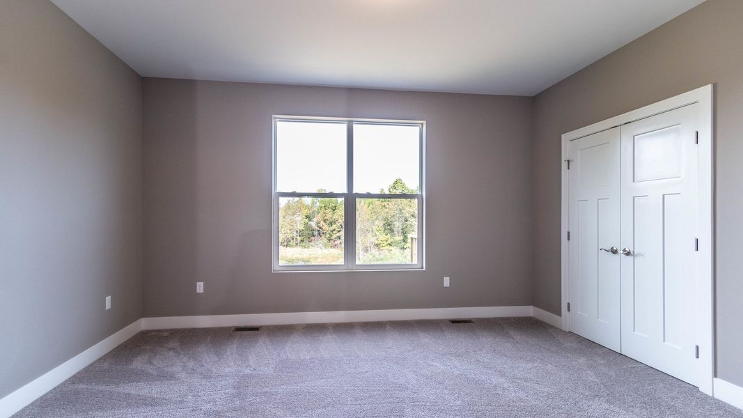 Representative unfurnished interior of a home built from the The Boulder Side Entry by Norfolk Homes in The Grande Estates, Jackson (Image 24).